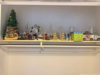 Full shelf view of entire Christmas decor lot
