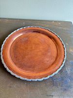 Top view of copper serving tray showing interior and rim
