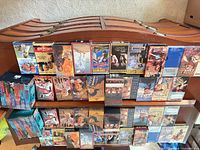 Overview of all VHS tapes laid out on table