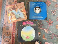 Front jackets of three LPs Carole King, Linda Ronstadt, Heart