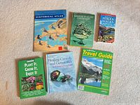 All six books laid out front covers visible