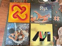 Front covers of all four LPs