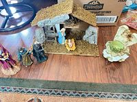 Full set showing stable, five nativity figures and angel bowl