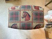 Top view showing equestrian plaid upholstery