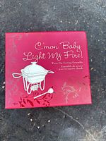 Front of red box showing product name and illustration