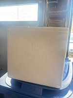 Front view of one foam container showing overall form