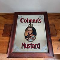 Full view of framed Colman's Mustard advertising mirror