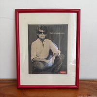 Front view of framed Levi’s advertisement