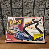 Front view of Tyco TR-X box showing graphics and product information