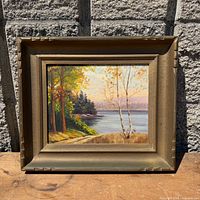 Frontal view of framed oil painting