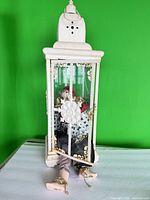 Lantern with clown doll inside, full view