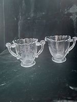 Sugar bowl and creamer front view