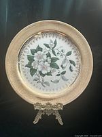 Full view of Collingwood porcelain plate on stand