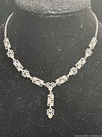 Front view of entire necklace on bust