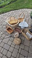 Group shot of all baskets, wall hanger and frames on patio