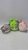 Front view of all three Squishmallows keychains