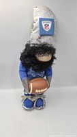 Full view of handmade gnome doll