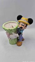 Full view of ceramic Mickey Mouse planter vase showing character details and planter opening