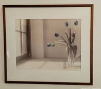 Full view of framed print on wall