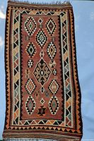 Full view of kilim rug showing entire pattern and borders