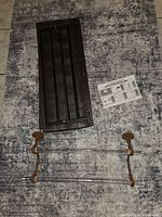 Towel bar, foam insert, instructions visible