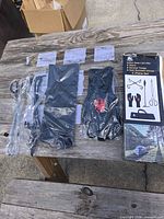 overview of all components in plastic wrap on table alongside box