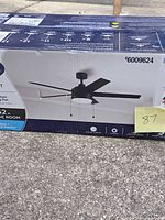 Retail box showing Harbor Breeze Sunport ceiling fan image, model and specifications