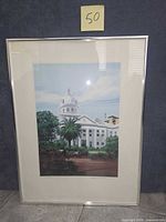 Frontal view of framed print with mat and frame