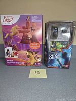 Spirit Hoppin' Horses board game box beside Bandai Vital Hero blister pack