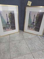 Both framed prints side by side