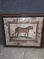 Leopard artwork in frame