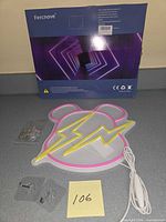 Box rear showing Ferncnove branding and neon sign illustration