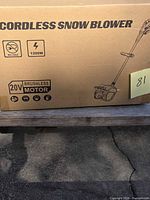 Carton showing Cordless Snow Blower specifications 20V, 1200W