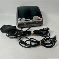 Printer front with power adapter and USB cable