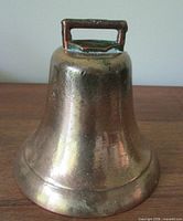 Front view showing bell shape and patina