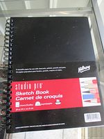 Front cover showing brand, series, sheet count, size, and art media suitability