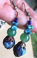 Earrings hanging showing bead sequence and hooks