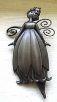 Front view of pewter flower fairy pin