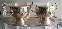 silverplate creamer and sugar bowl on tray, frontal view