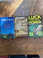 Front covers of all three books