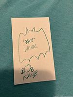 Full view of front of index card with inscription and signature