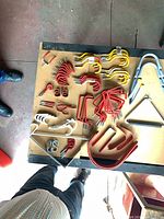 Top-down view of assorted hooks spread on table