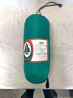 Packed Woods Labrador sleeping bag in green stuff sack