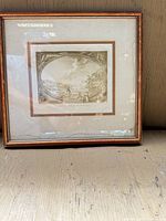Full view of framed engraving showing mat, frame and water staining
