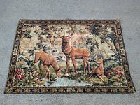 Full view of tapestry showing entire deer forest scene