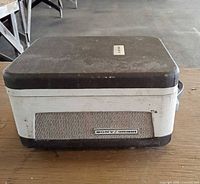 Closed tape recorder inside carrying case showing Sony Tapecorder badge