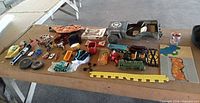 Wide view of all assorted toys on table