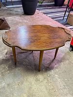 Full view of oval coffee table on floor