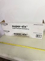 Closed box with Super-Six CGSB Vapour Barrier branding