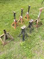 Group of seven jack stands on grass